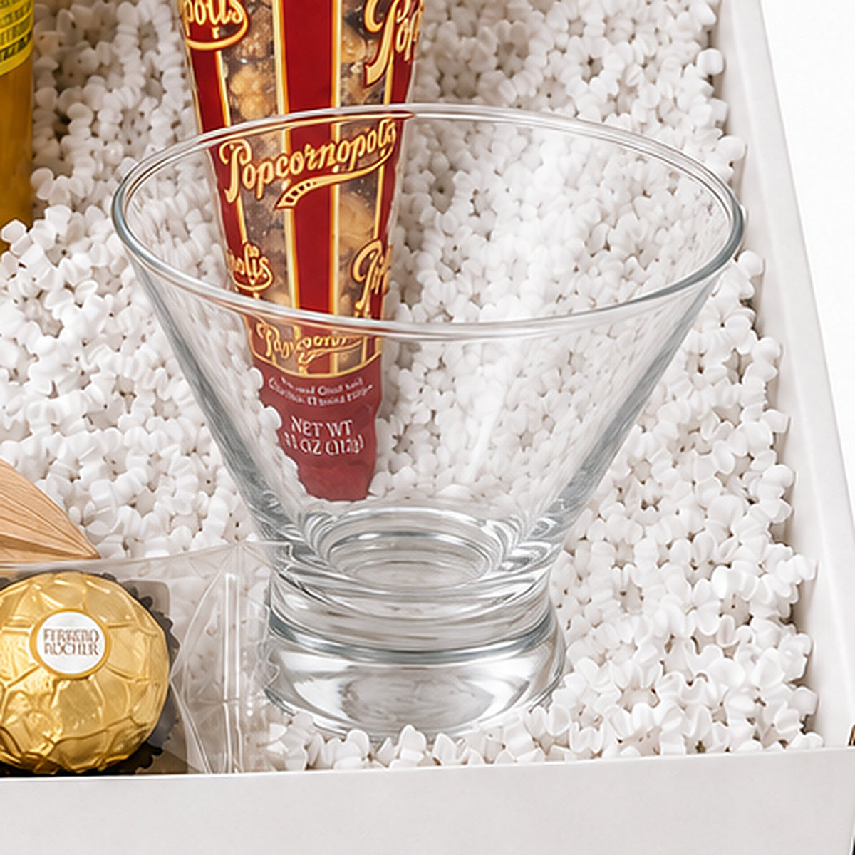 Close-up of the stemless martini glass included in the Lemon Drop Martini gift set.