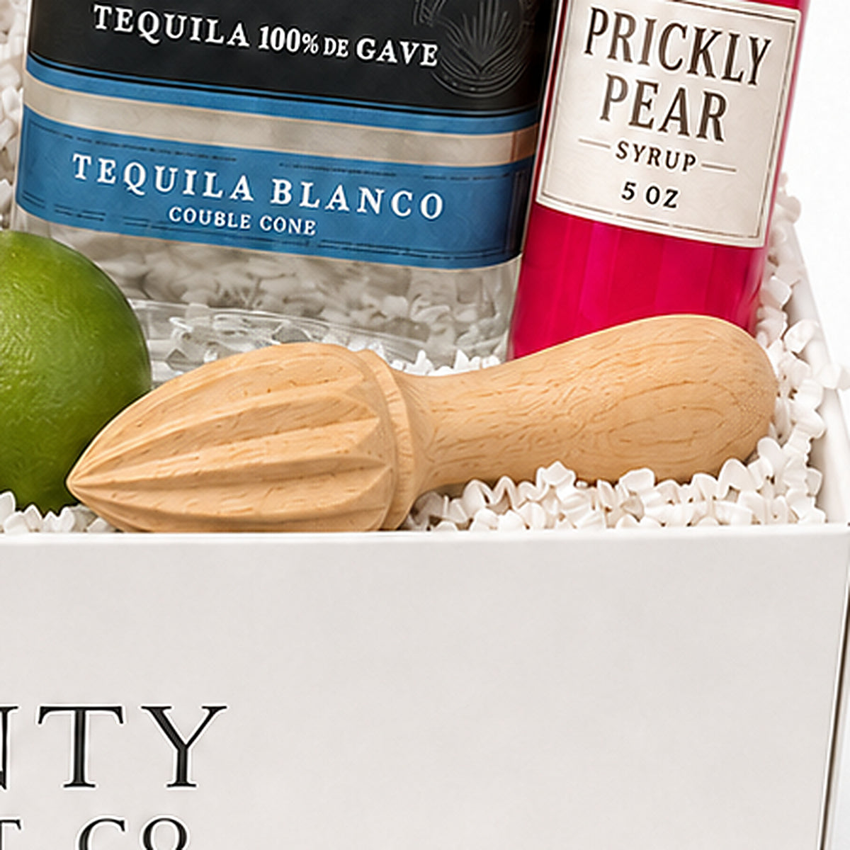Close-up of the Wooden citrus reamer included in the Margarita Gift Basket.
